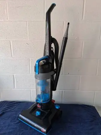 Bissell Upright Vacuum Cleaner with crevice tool extension