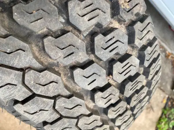 Spare steel wheel and 245/70-16 tire from 1996 jeep grand Cherokee zj