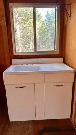 Vintage farmhouse drainboard sink and cabinet