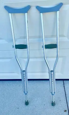 Pair of Short Aluminum Crutches , adjusts from 4’ 2” to 5’2”