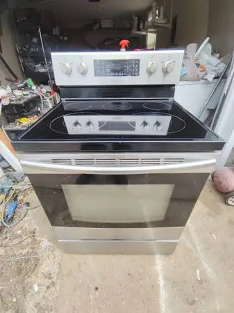 SAMSUNG 5 BURNER STAINLESS ELECTRIC STOVE. WORKS LIKE NEW!