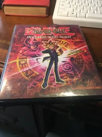 Vintage Yu-Gi-Oh binder trading game card sleeve book with 103 cards