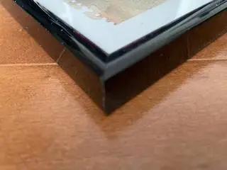 two black polished metal picture frames w/ glass