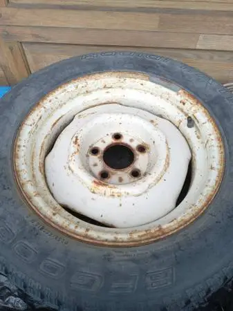 P 205 / 60 / SR15 - Studded Snow Tire on Rim - Reduced Price