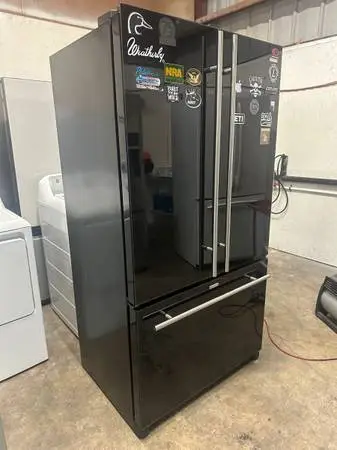 Tinted black glass finish Jenn-Air Frenchdoor Water & ice inside cabin