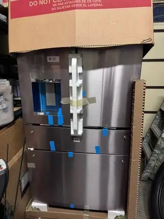 GE PROFILE FRIDGE. NEW IN BOX. NEVER USED