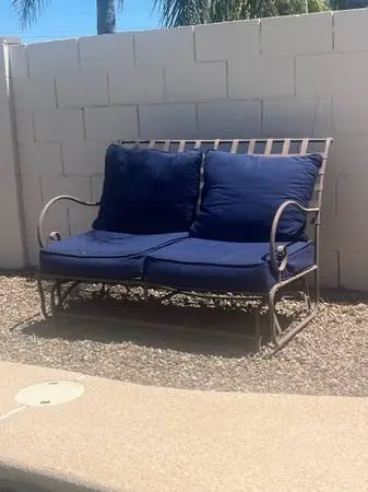 Vintage metal patio glider sofa in style of Brown Jordan Florentine settee