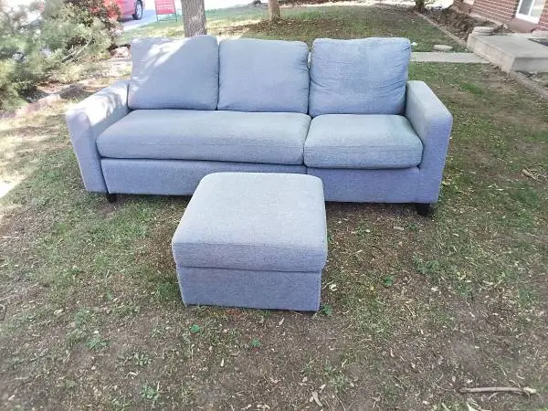 Grey couch with matching ottoman (can deliver)
