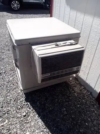 Window swamp cooler. Needs a little work.