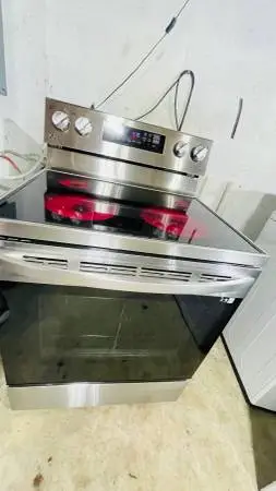 LG Stove a dent on top of the glass
