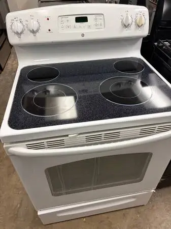 GE White Smooth Top Self Clean Stove