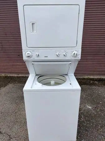 LIKE NEW Kenmore 27 in stack, washer n stainless tub Electric dryer