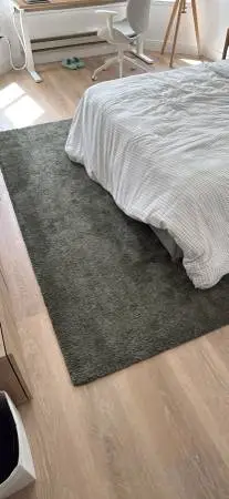 Multiple large rugs - green, yellow, grey