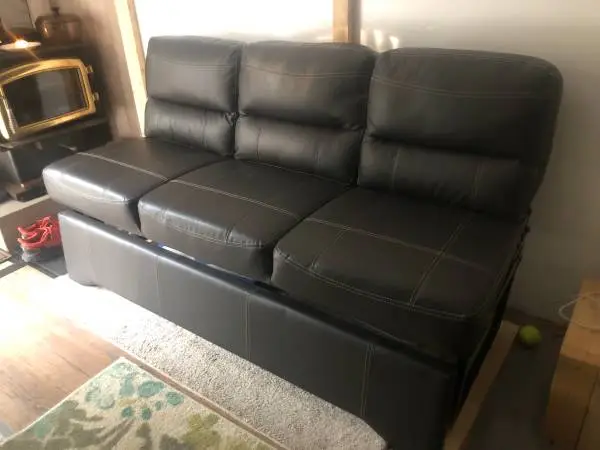 Small Sofa with cup holders like new condition