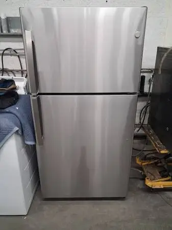 New 22 cubic foot top and bottom refrigerator