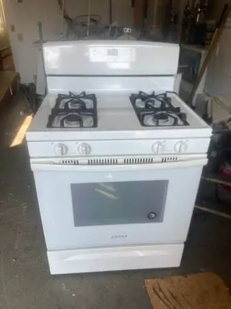 White Amana gas stove