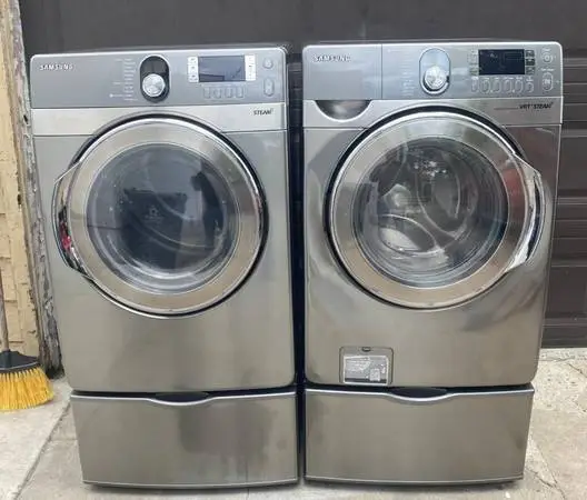 Samsung steam front load washer and gas dryer pedestal included