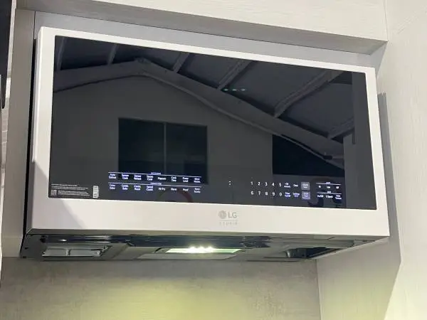 BOUGHT AND DIDNT USE 30 MICROWAVE IN WHITE