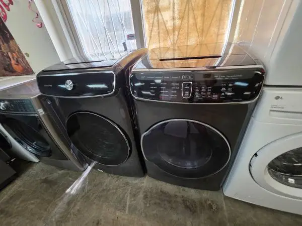 Samsung 6.0 cu ft Steam jumbo washer and gas dryer