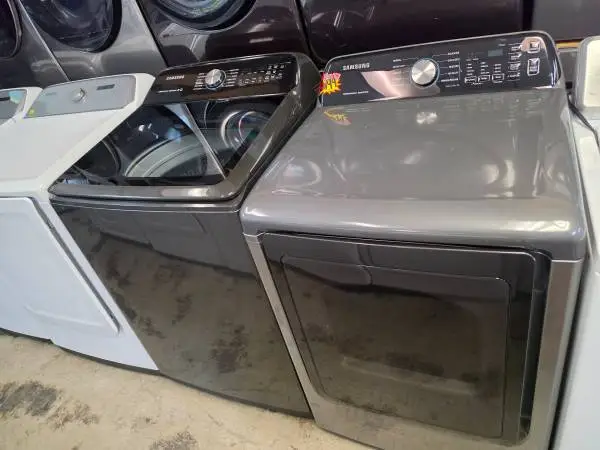 Samsung black top loading washer and gas dryer