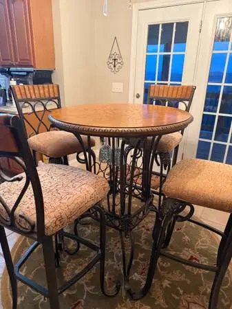 Tall pub wine rack table with 4 stools