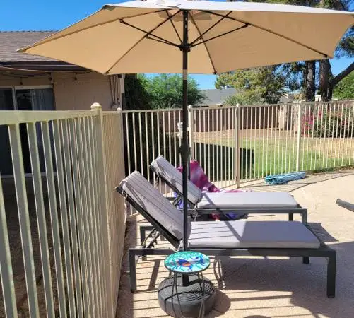 Pool umbrellas, umbrella bases, loungers/ lounge chairs, table,Big Joe
