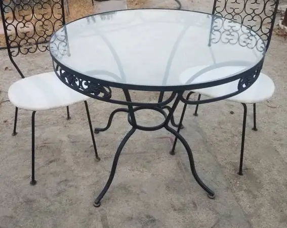 Mid-Century Modern cast iron patio or garden table  Round glass top