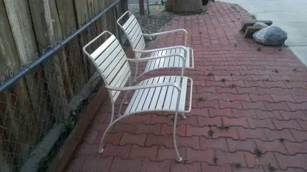 Mid Century Heavy Wrought iron and Vinyl matching Pair of Patio Chairs