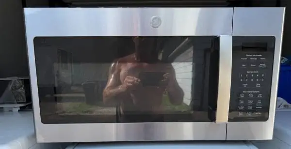 Clean & Tested GE 1.7 cu ft Over-the-Range Microwave Stainless — $100