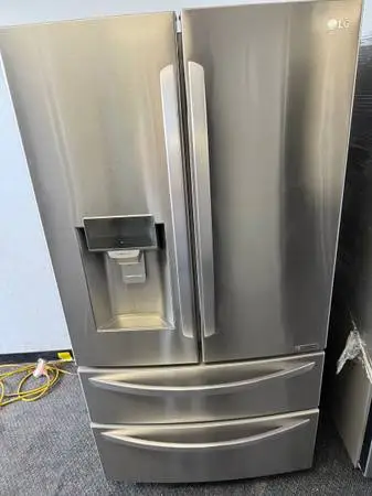 French doors stainlees steel bottom freezer and refrigerator