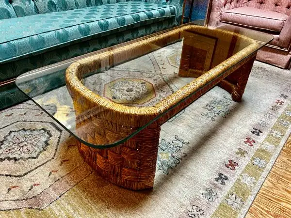 Vintage woven wicker coffee table with glass top