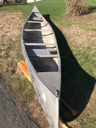 Alumacraft Quetico 17C model, with curved center thwart or bar, in goo