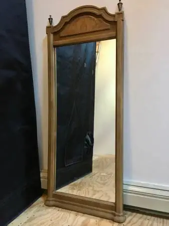 Tall vintage wooden mirror