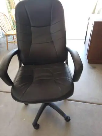 Black vinyl desk chair - good condition NO tears or worn