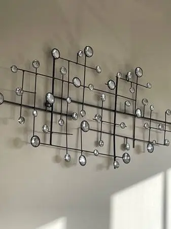Large mirrored wall hanging