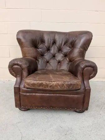 Leather tufted wingback armchair