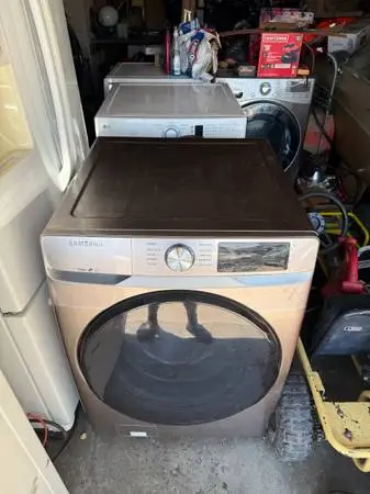 Gray Samsung front load washing machine clean good working condition f