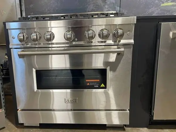 BOUGHT AND CANT RETURN 36 INCH GAS RANGE