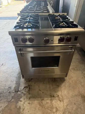 Wolf Stainless Steel 30” Gas Stove/Subzero 36” Built In Fridge