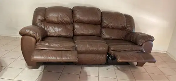 Ashley matching reclining sofa and rocking chair that reclines