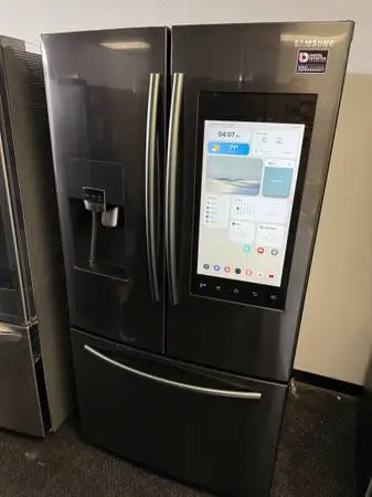 Family hub Black stainless steel refrigerator and freezer