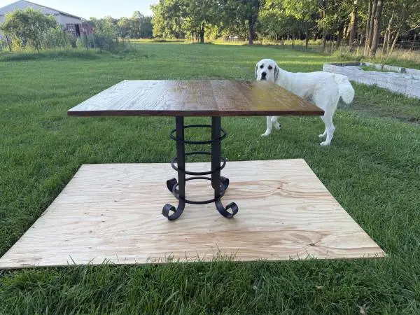 Table with wrought iron base