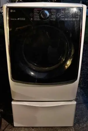 LG DRYER WORKS GOOD can be stacked if you take the pedestal off. $100.