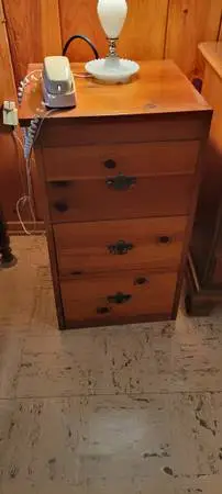 3 drawer piece of furniture