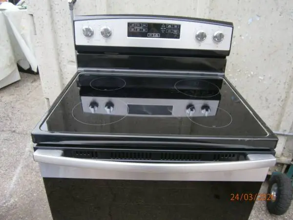 Whirlpool black/stainless smooth top stove