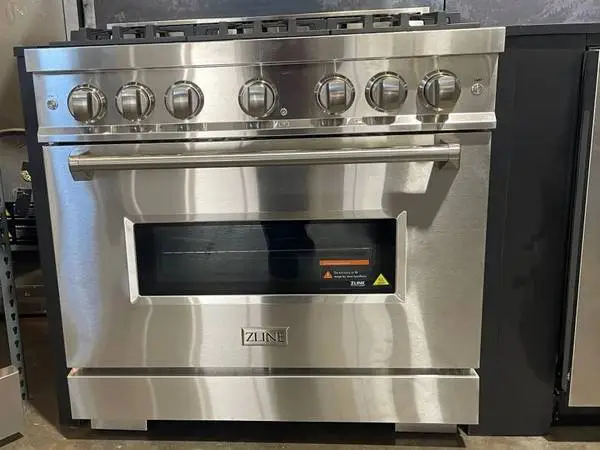 BOUGHT AND CANT RETURN 36 INCH GAS RANGE