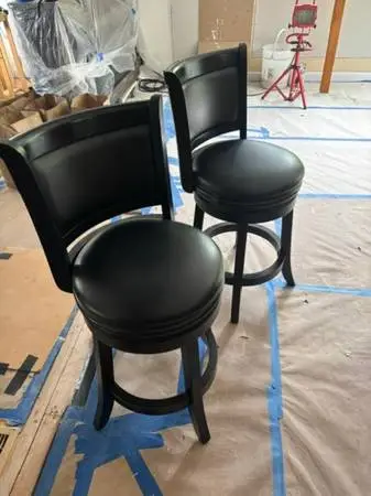 2-Black swivel chairs