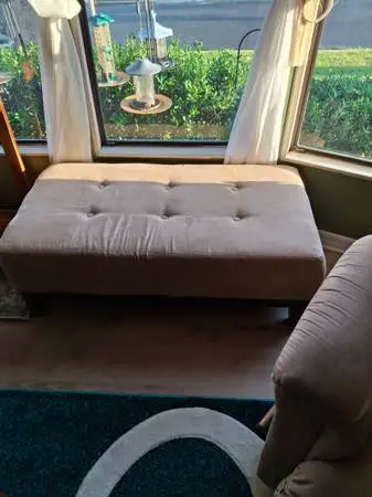 Attractive beige velour ottoman