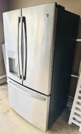 GE Refrigerator/Ice Maker /Dispenser/Stainless Steel.