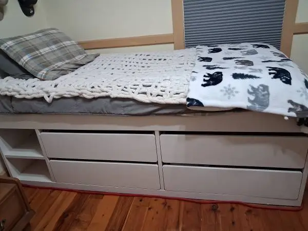 Twin white IKEA bed frame with storage drawers